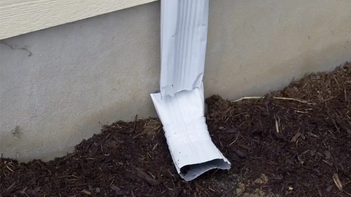 Dented Downspout repair in chicago il - B&B Roofing and Exteriors
